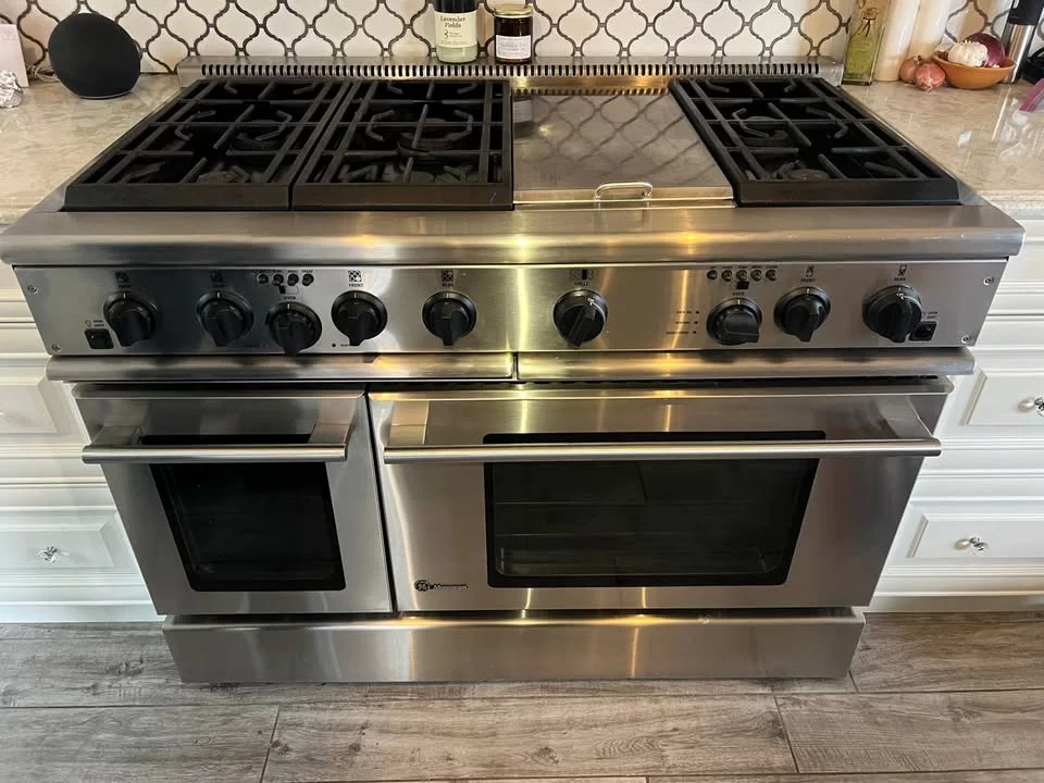 A modern oven and stove setup in a contemporary kitchen, showcasing the design and function.