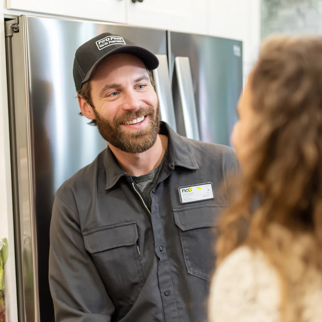 A group photo of FixPulse team members taken in front of a commercial van with the company logo, representing unity and service.